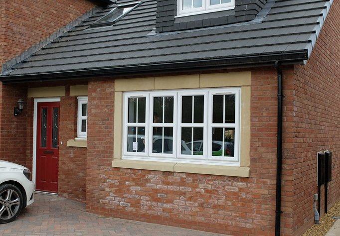 Finished home exterior with bay window following garage works