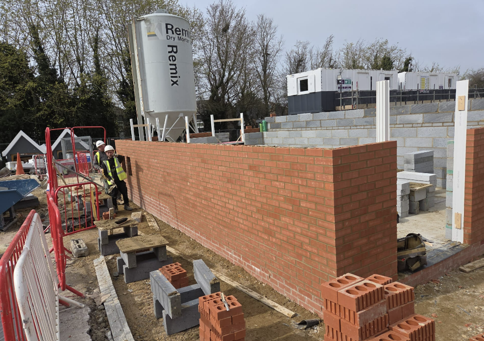 Scaffolded brickwork with mixed brick detailing
