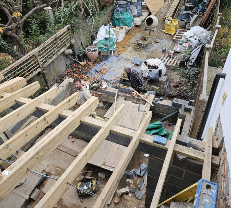 Extension walls built to damp-proof level, ready for joists