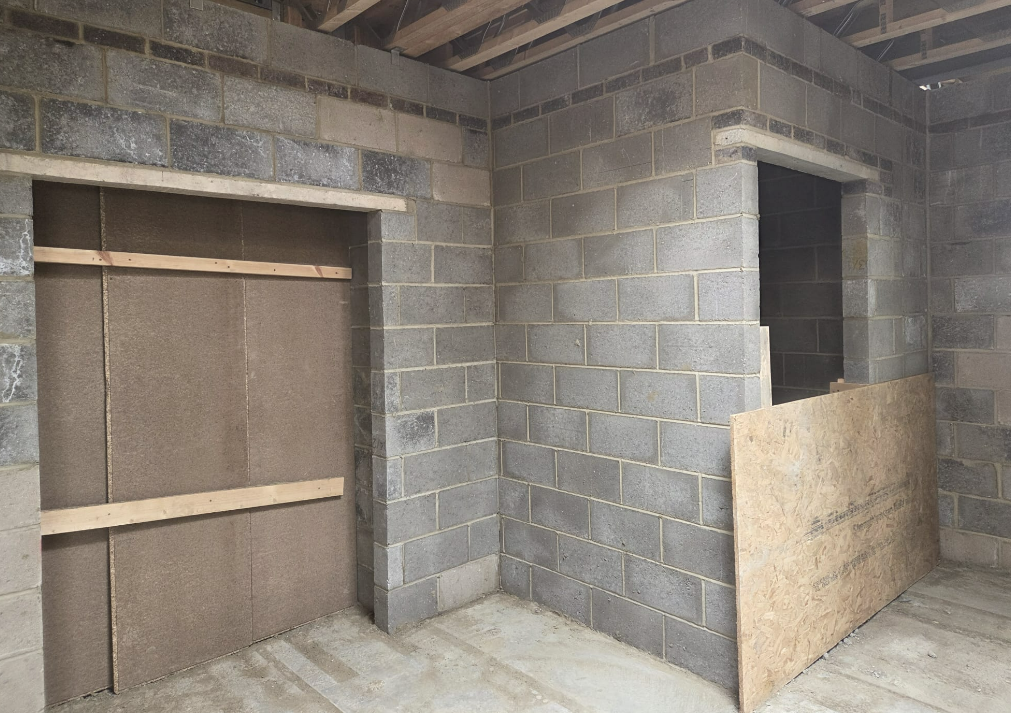 Internal blockwork walls with window and door openings